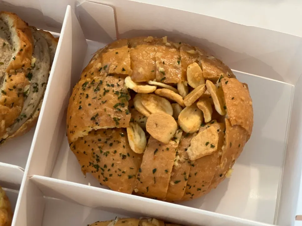 Baguette garlic bread topped with garlic crunch