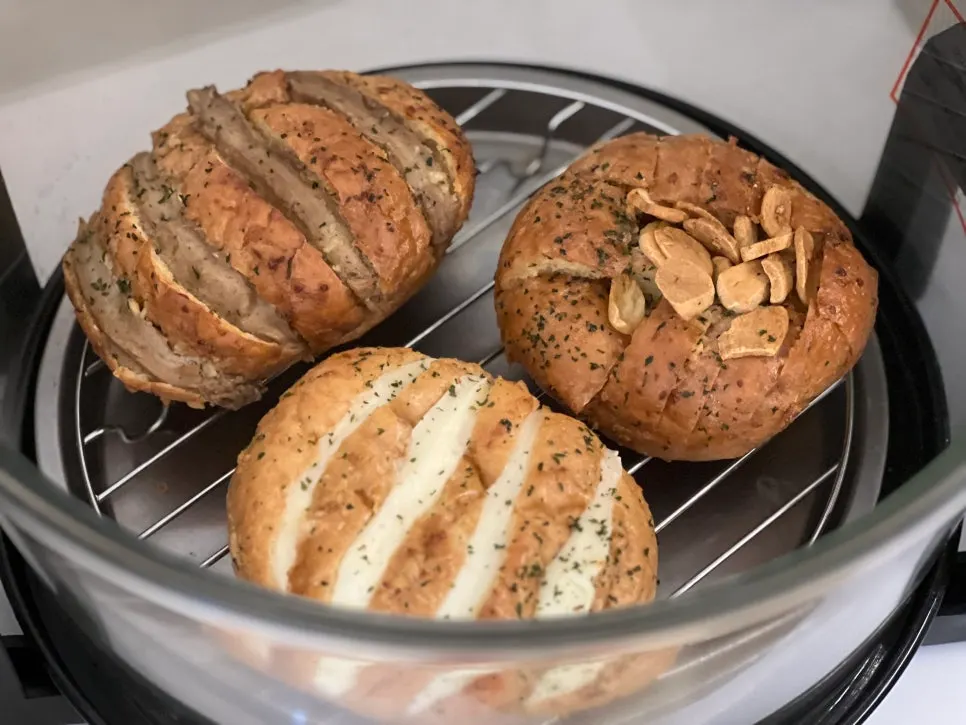 Garlic bread arranged on a plate