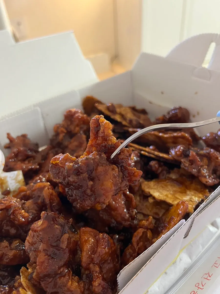Solid, meaty piece of dakgangjeong with no crumbs