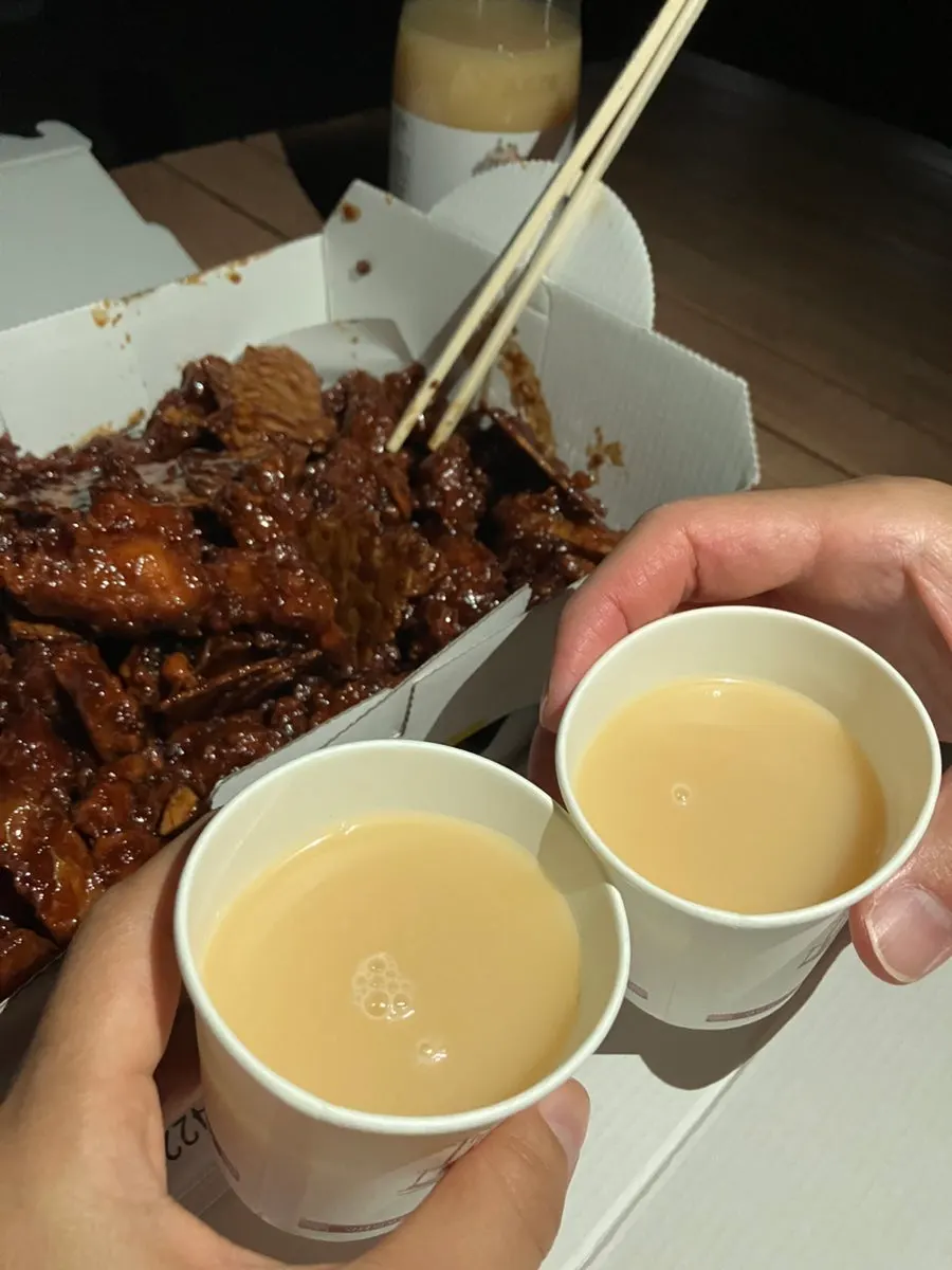 Takeout double black garlic dakgangjeong and makgeolli