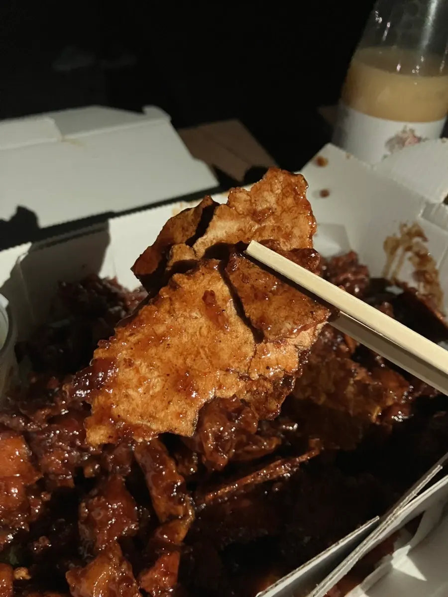 Nurungji soaked in sauce with chewy dakgangjeong