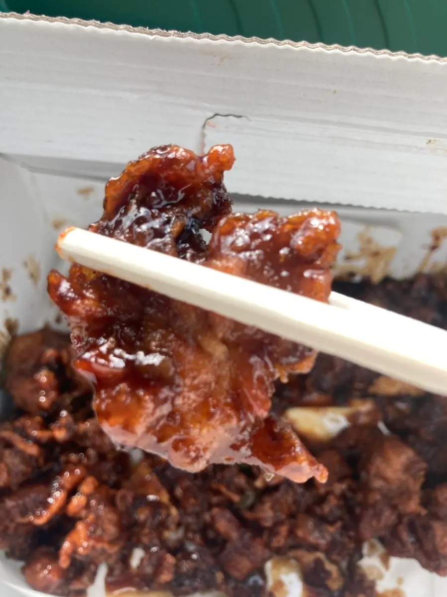 Takeout box of dakgangjeong, too much for two to finish