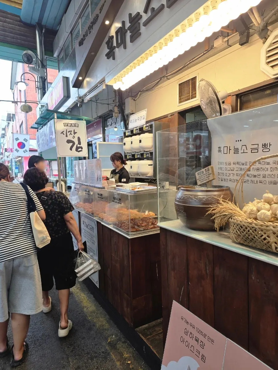 Original, garlic, black garlic, and soboro salt breads on display