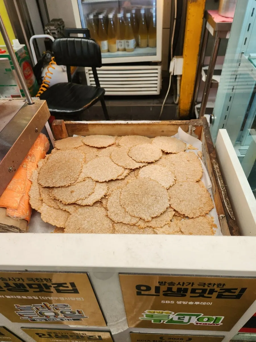 Dakgangjeong being fried in the kitchen