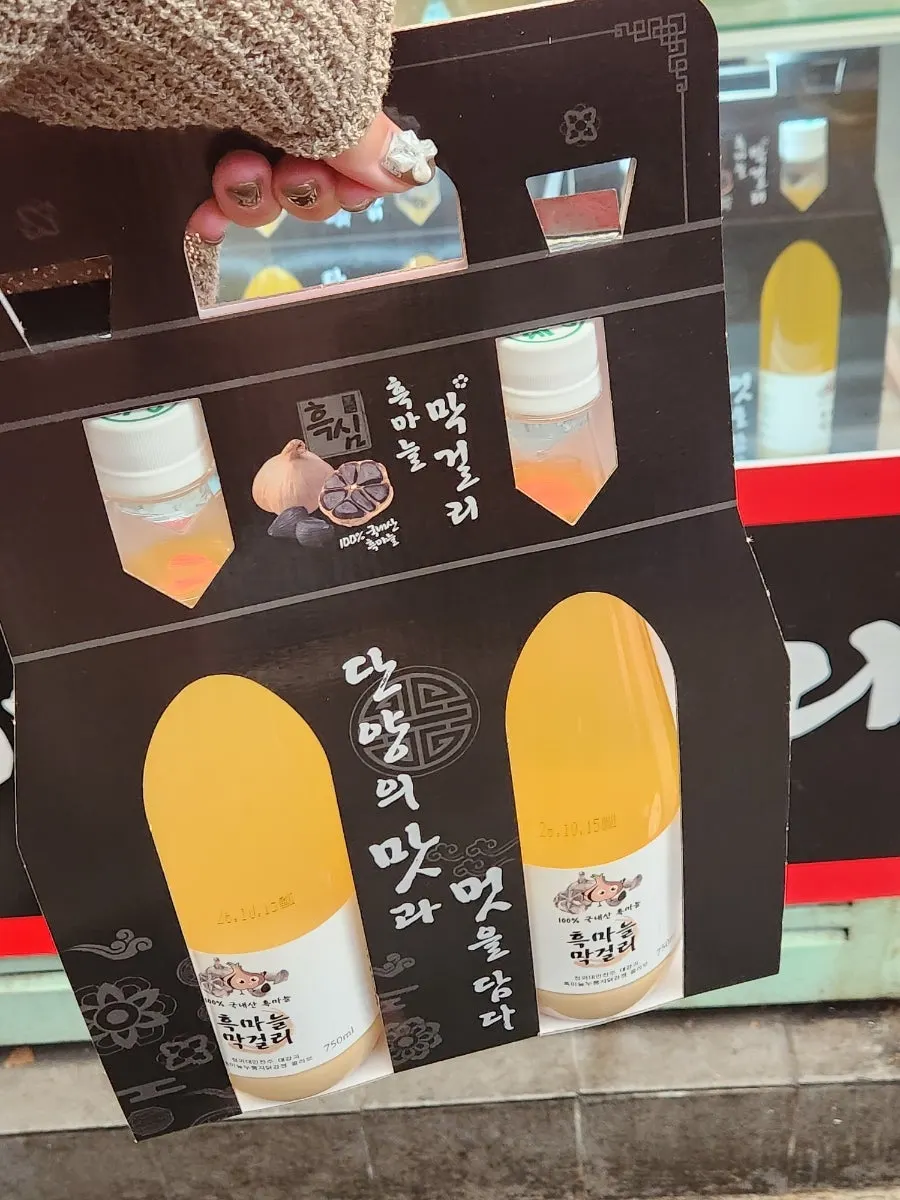Display stand in front of the shop with packaged dakgangjeong