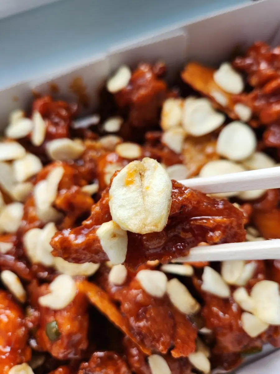 Original nurungji dakgangjeong topped with fried garlic