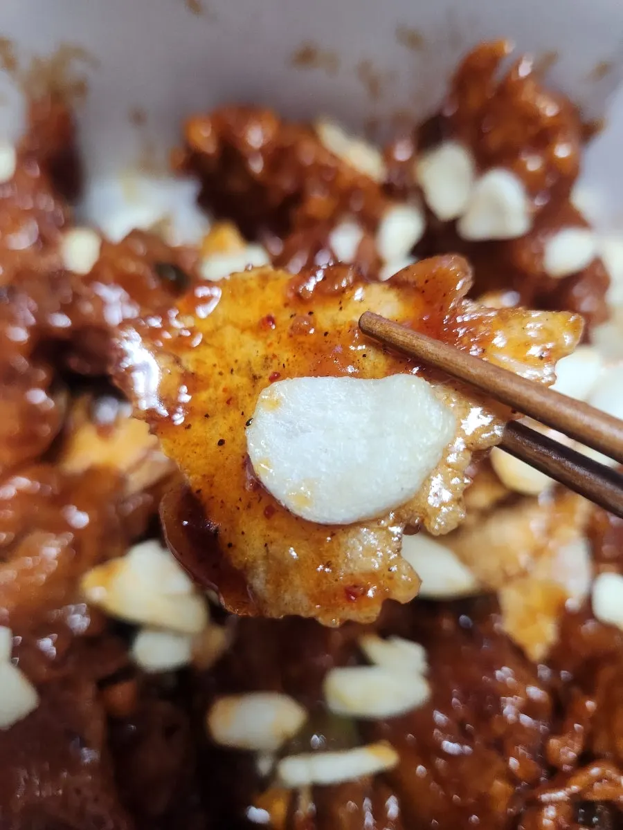 Fries served alongside the dakgangjeong