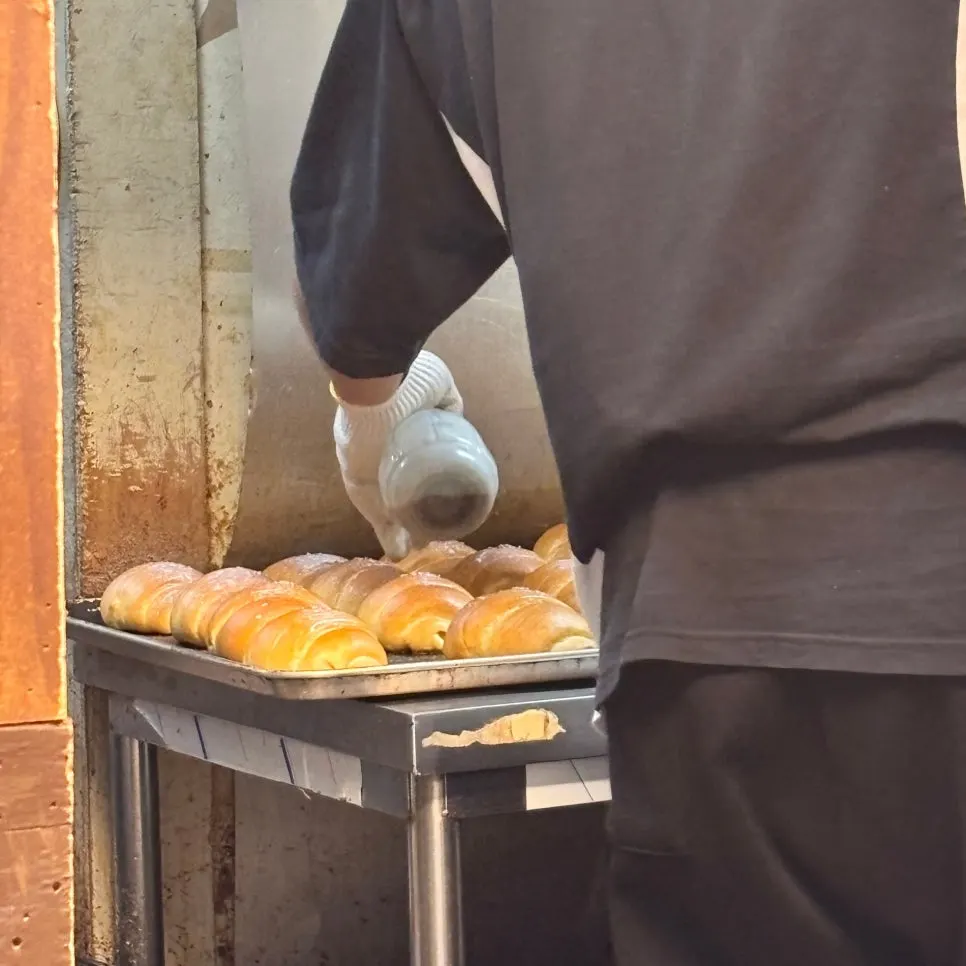 View of bread being made, visible from the waiting area