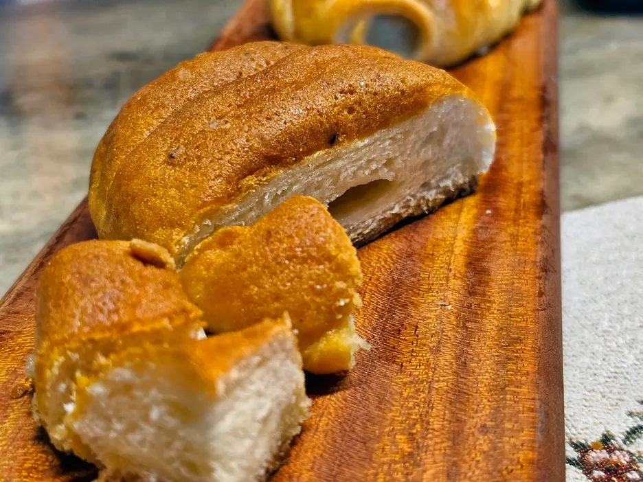 Cross-section of a streusel salt bread cut in half