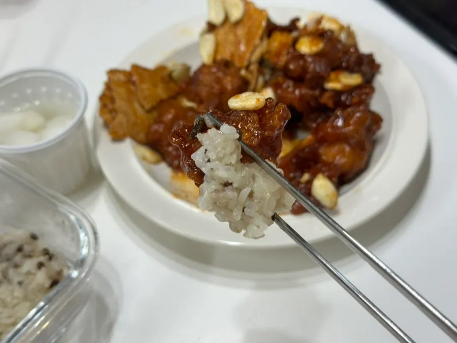 Dakgangjeong with nurungji and potato wedges