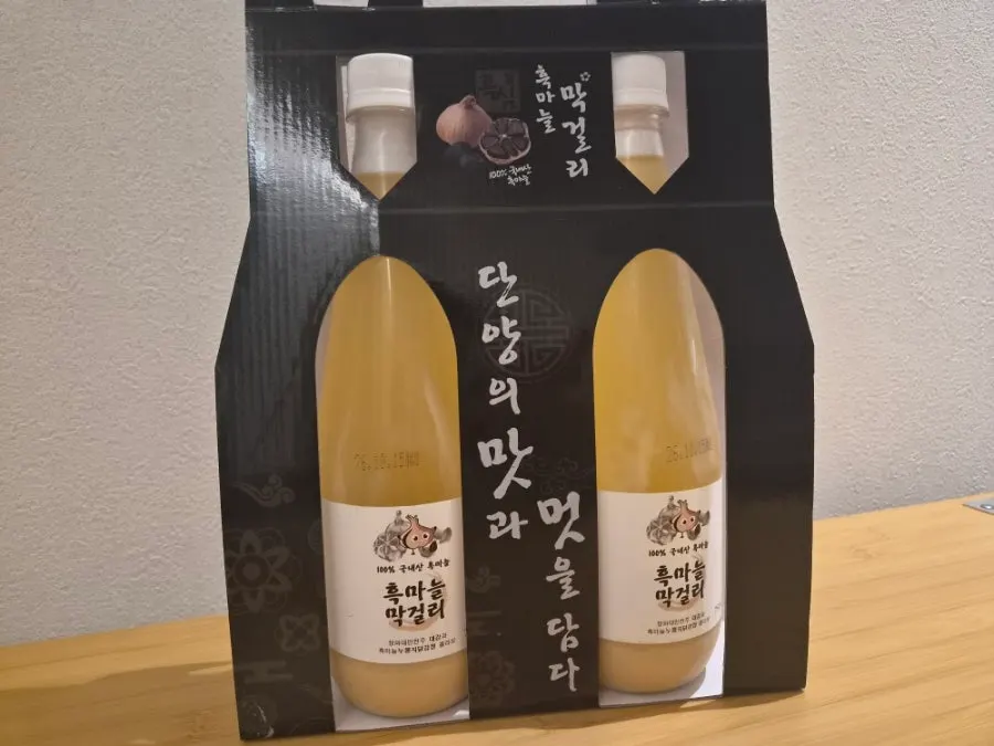 Bottle of black garlic makgeolli set aside for later