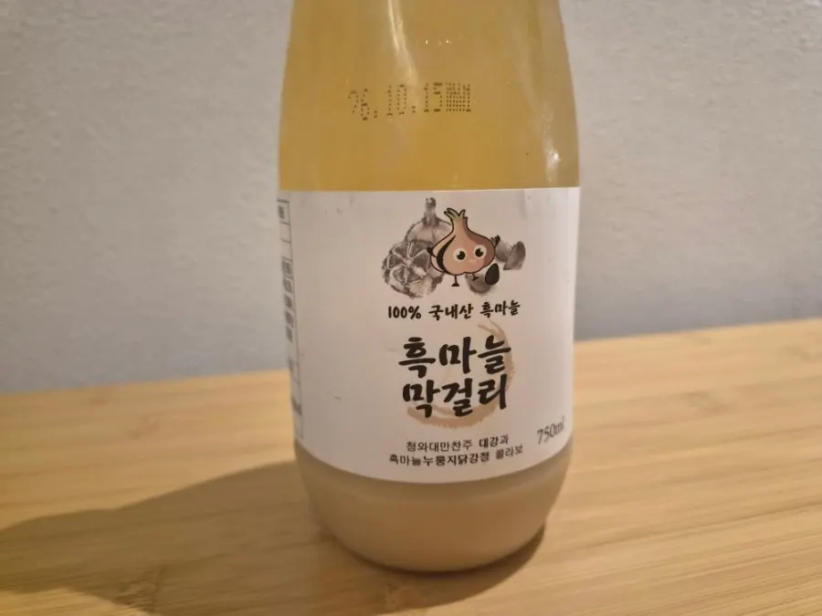 Label and expiration date on the black garlic makgeolli bottle