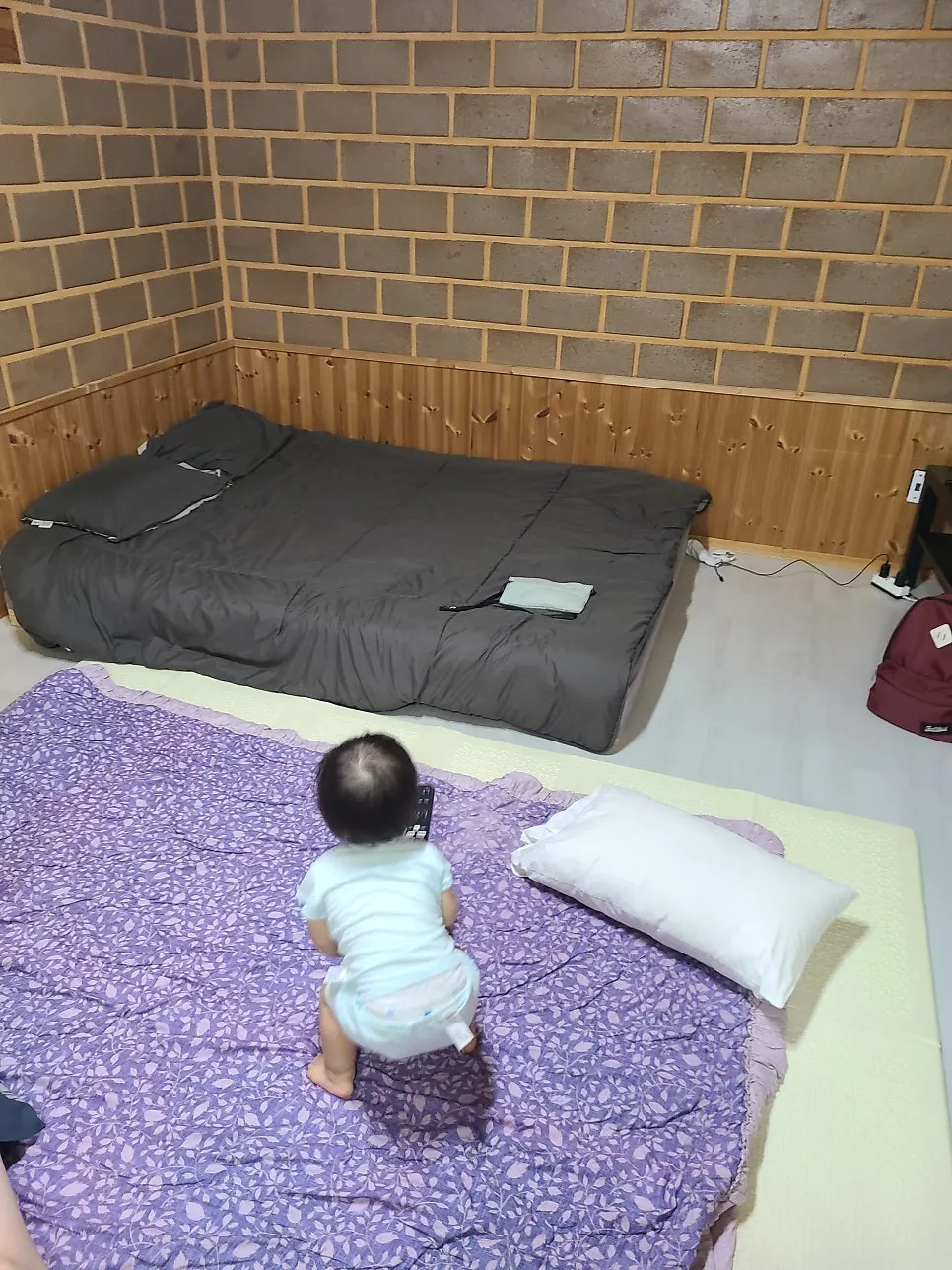 15-month-old baby playing in the room