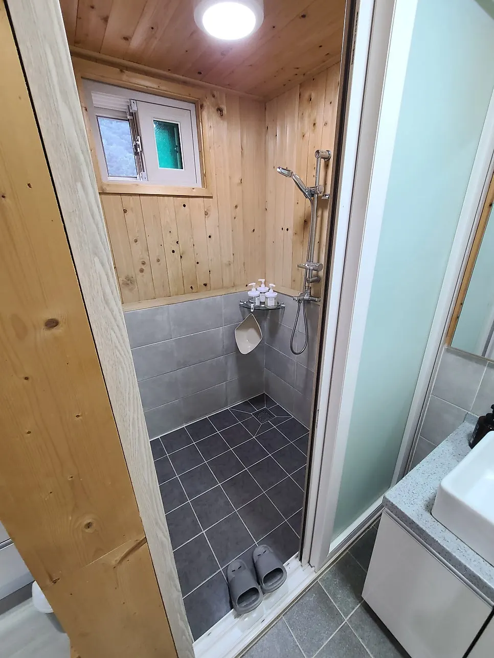Shower area of the room bathroom