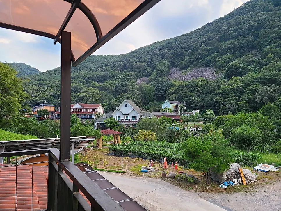 View of the mountains and sky from the room's terrace