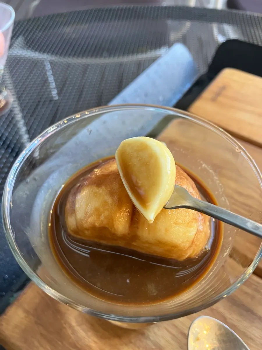 Dessert with peeled-garlic-shaped white chocolate inside