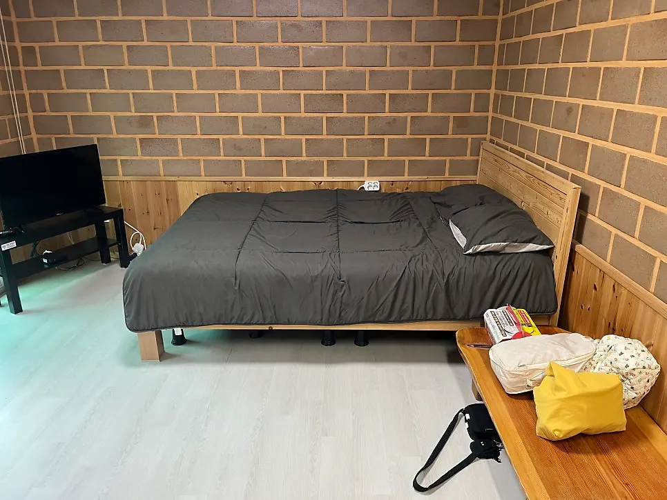 Bed and window area inside the room