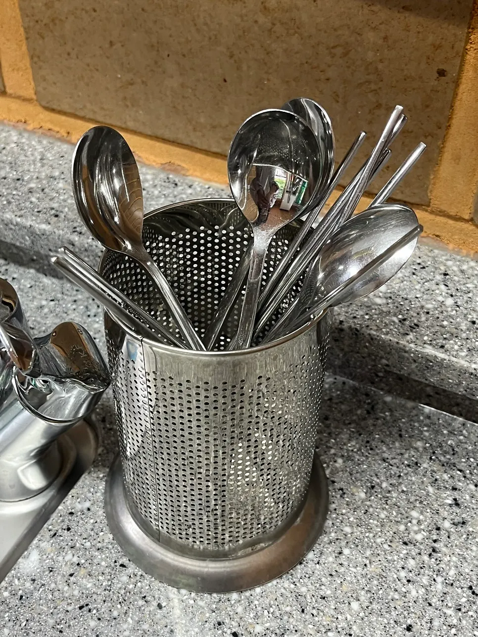 Kitchen tools storage including plates and pots