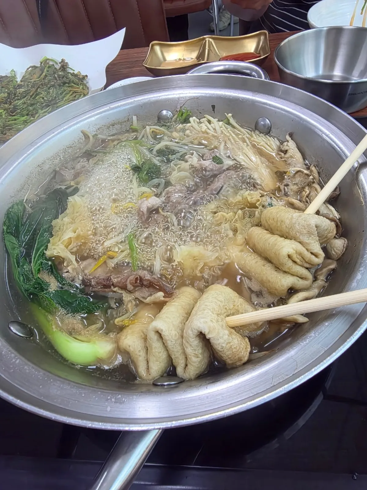 Shabu-shabu table setting at Daonjeong Shabu Son Kalguksu in Wirye