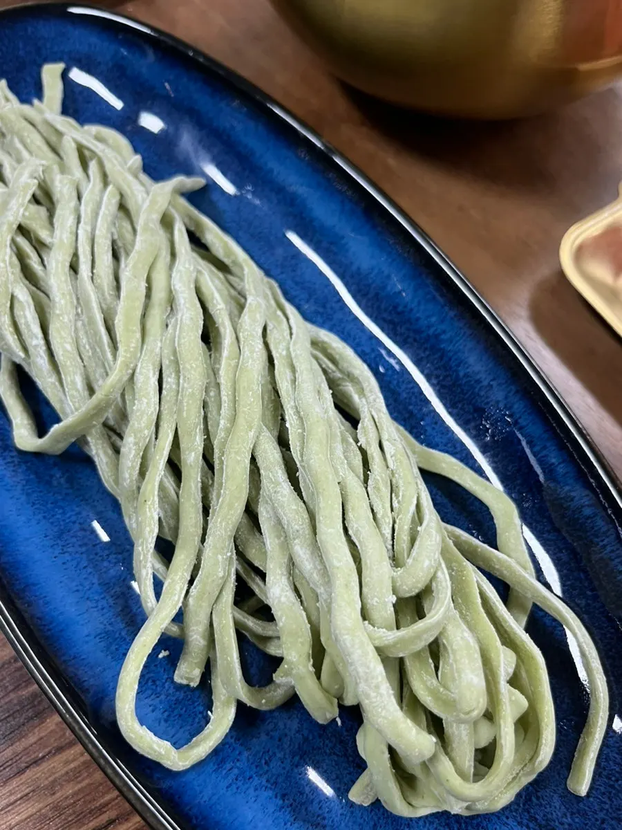 House-made kalguksu noodles made with Wando kelp