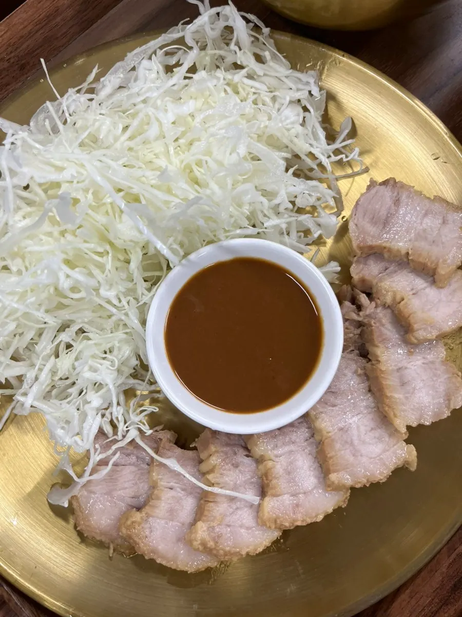 A glossy plate of hwangchil-braised pork