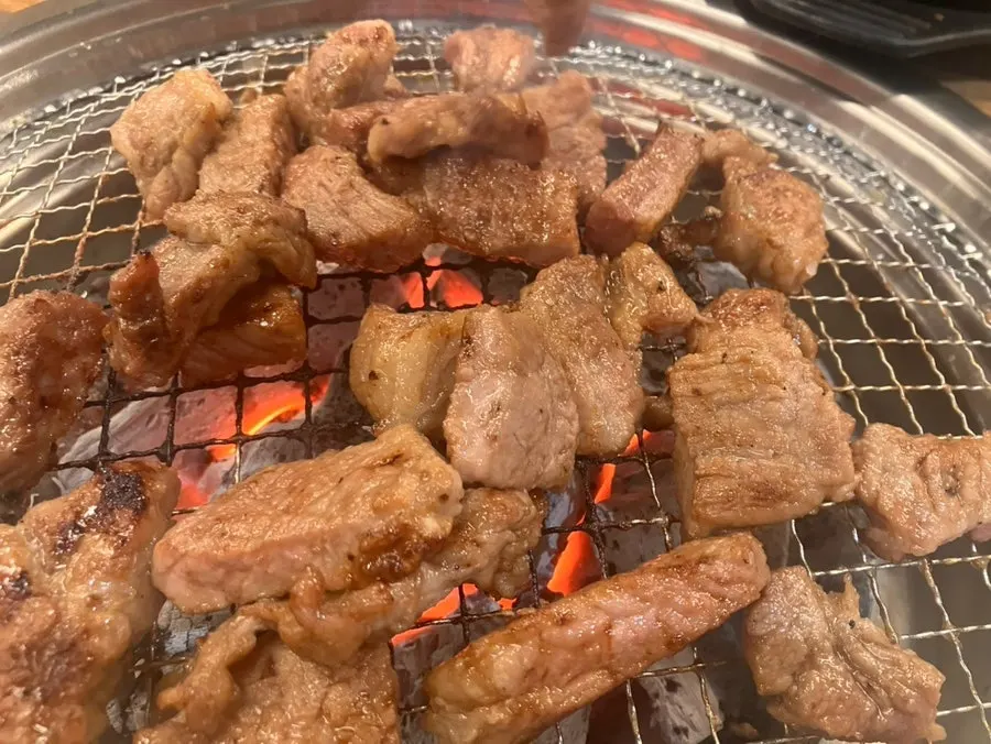 Pork neck enjoyed with a child