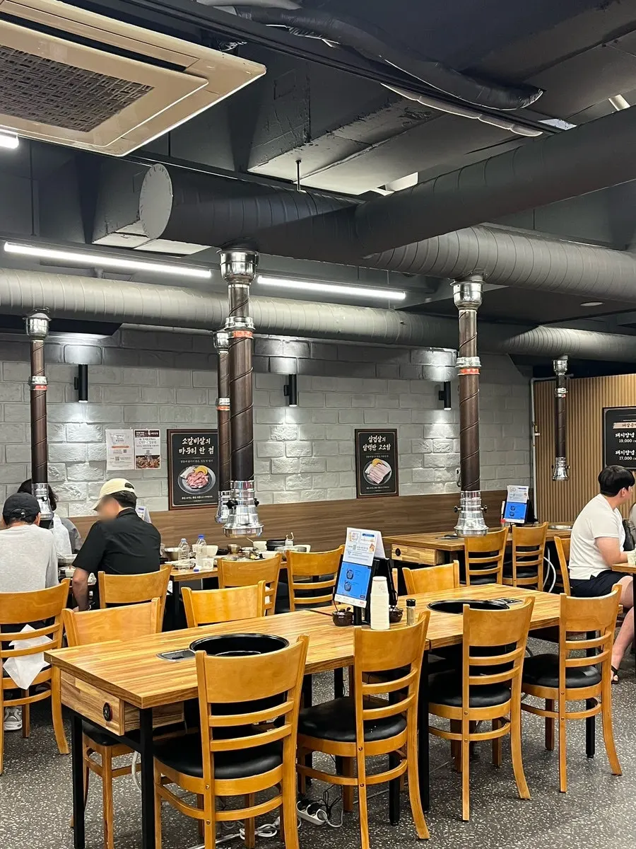 Dwaegal Gongmyeong Soba's dining room during a quiet moment without customers