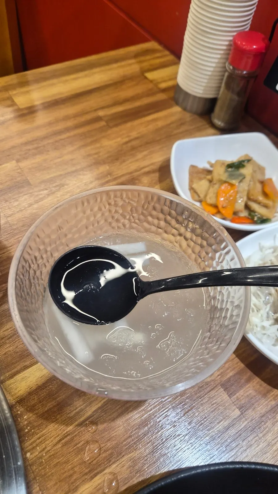 Side dish tray at Dwaegal Gongmyeong Soba