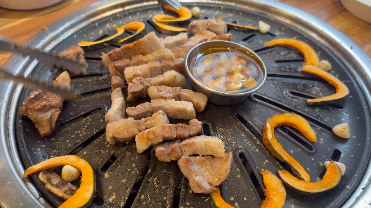 A full spread of charcoal-grilled Dapsimni pork ribs