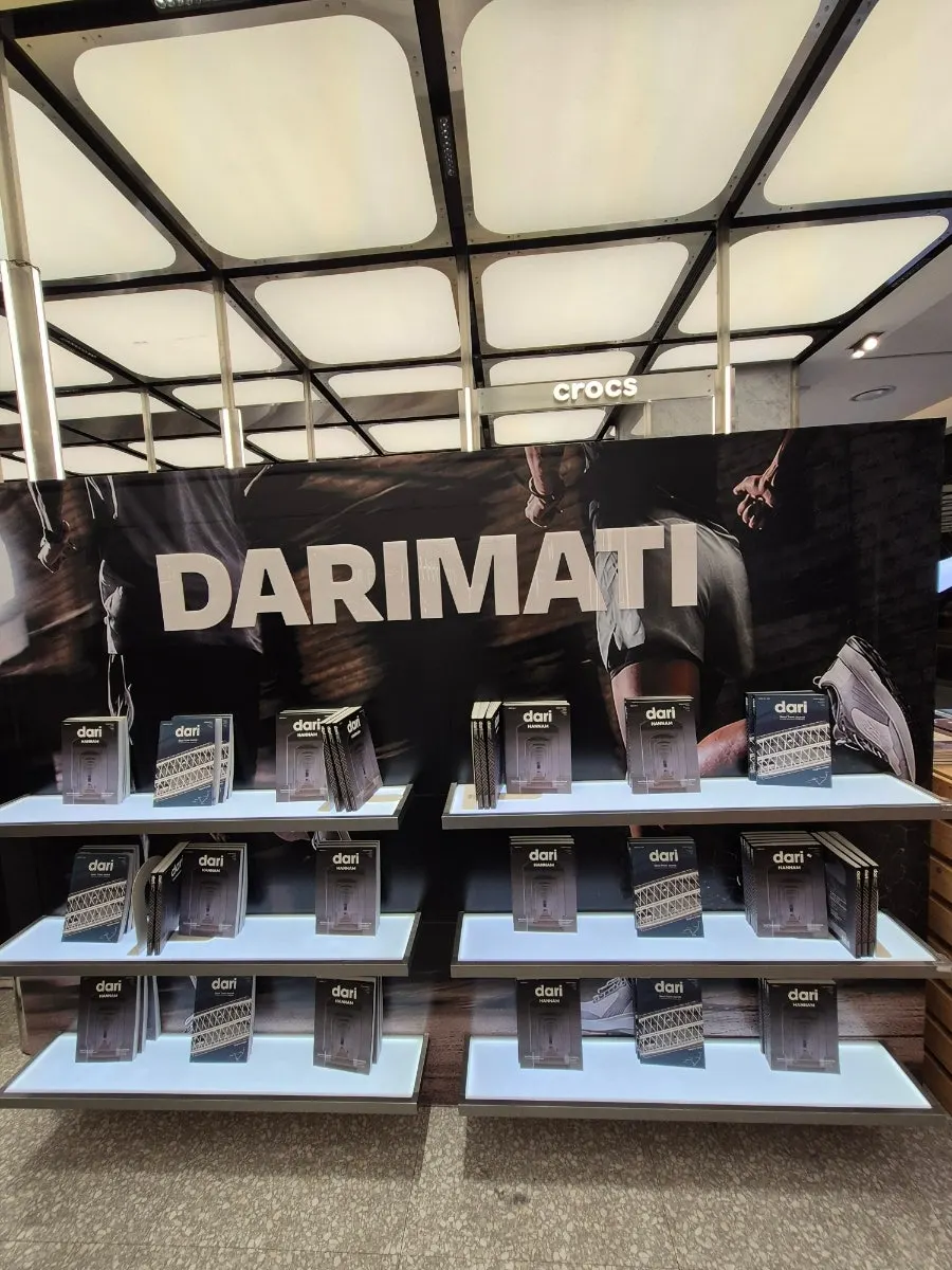 T-shirts and accessories display corner at the pop-up store
