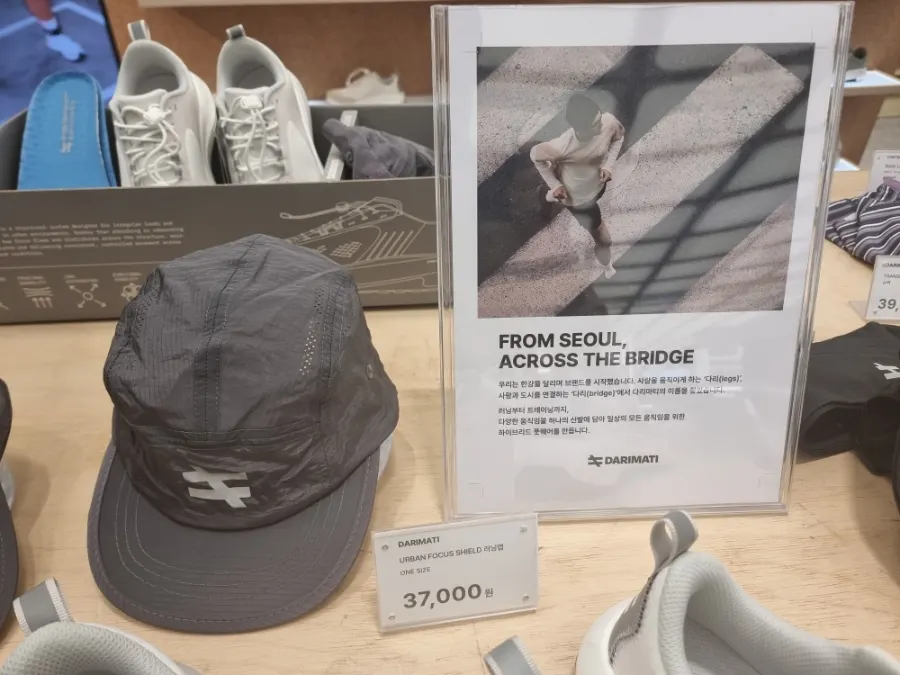Running belts and pouch accessories on display at the pop-up