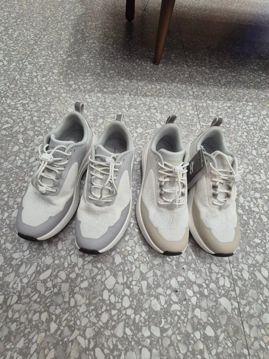 Two colors of the BR-001 training shoe placed in the store