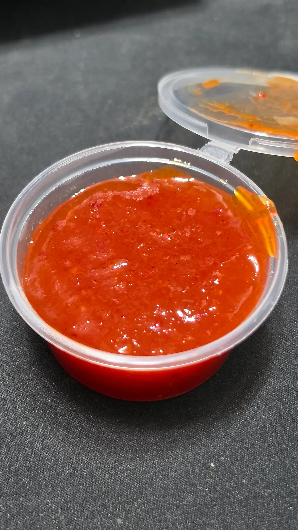 Seasoning sauce included alongside the chicken