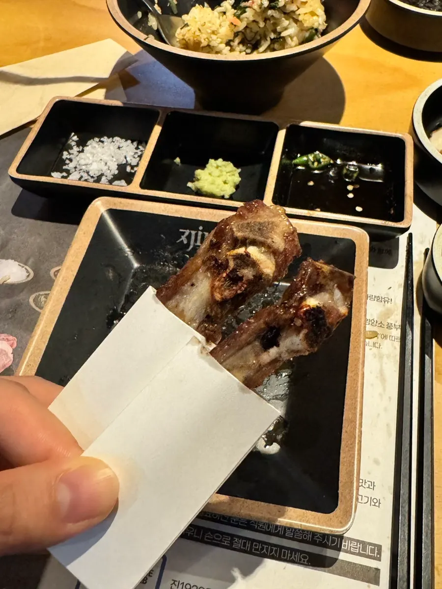 Small lamb rib bones served at the end of the meal