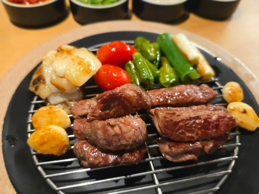 Lamb rack grilling on the pan
