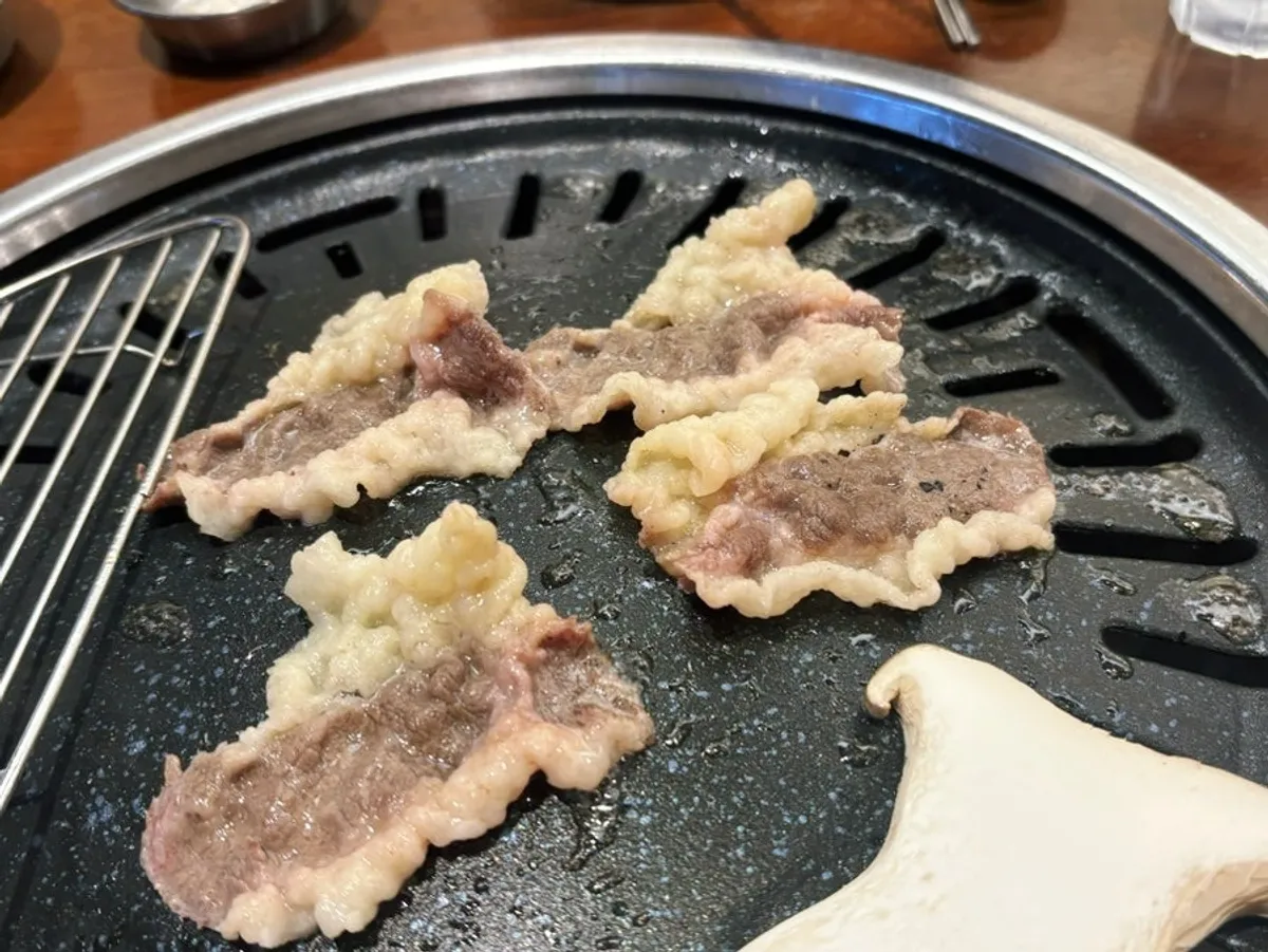 Savory doenjang jjigae served alongside the chadolbagi