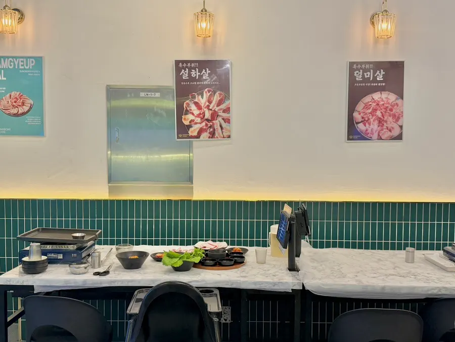 Restaurant interior with plastic-wrapped tables