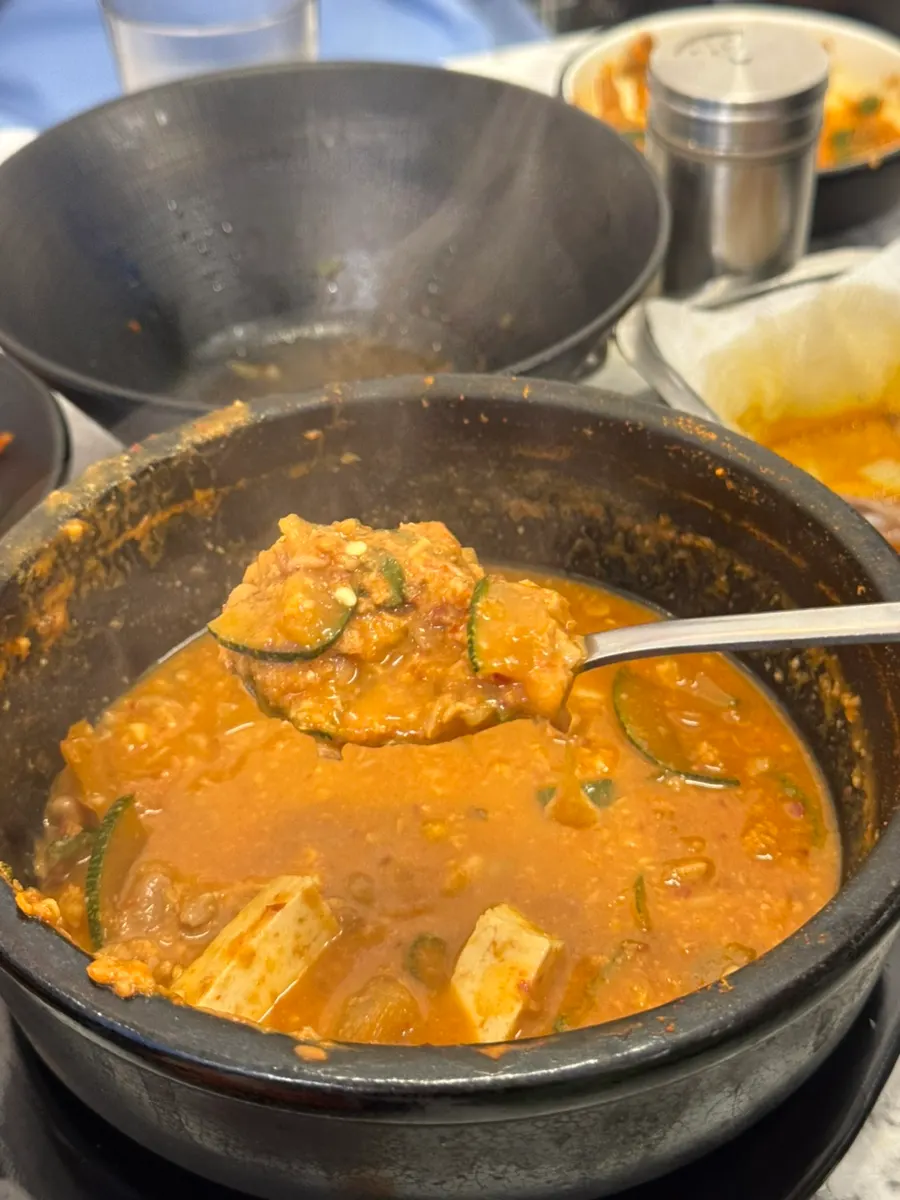 Close-up of bubbling cheonggukjang stew