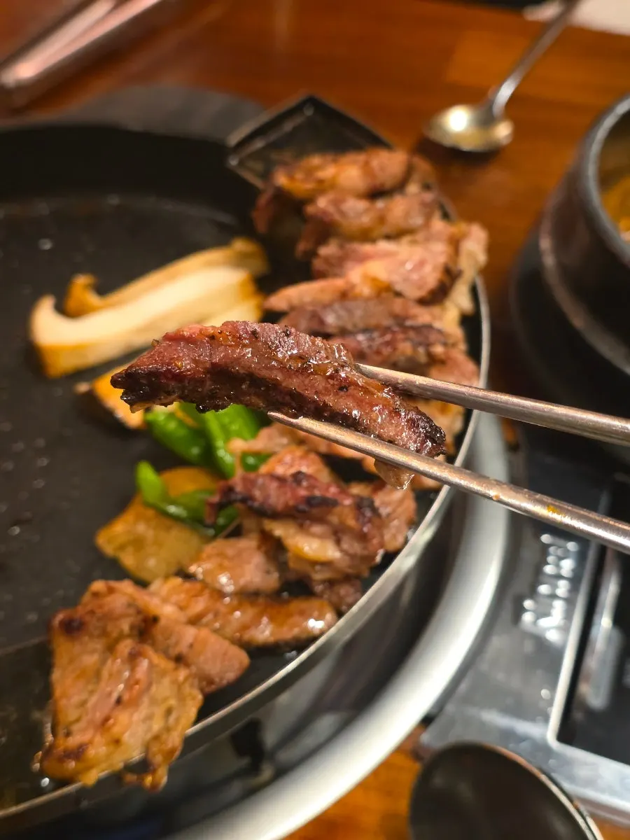 Finished woodae galbi placed on the side plate