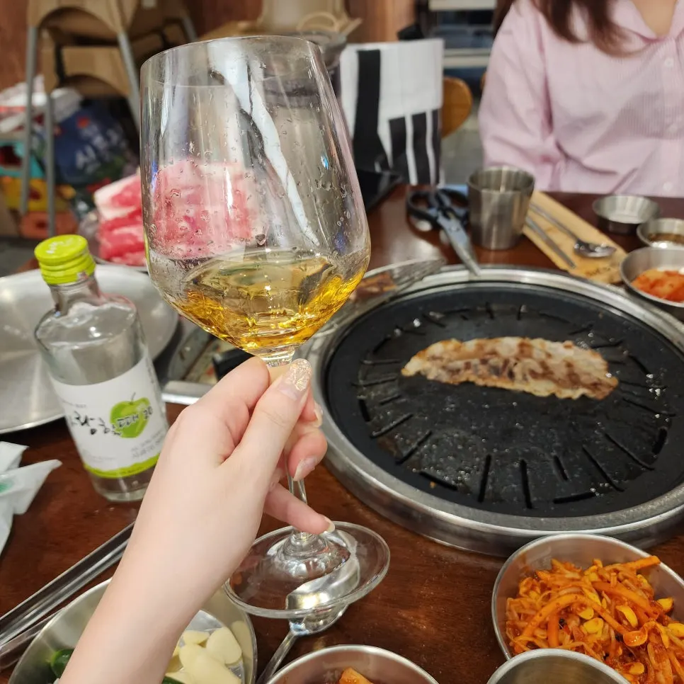 A glass of poured apple spirits