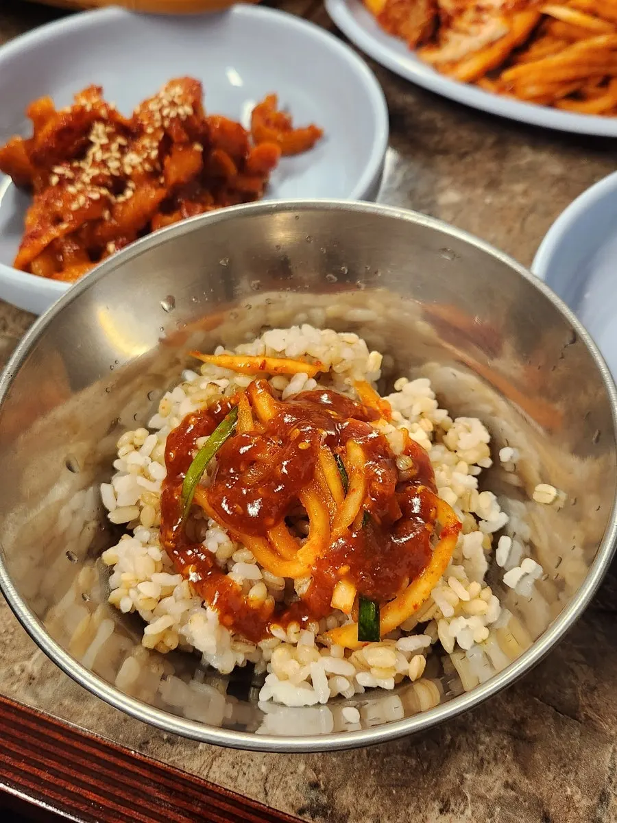 Medium-size bossam served over a bed of chives