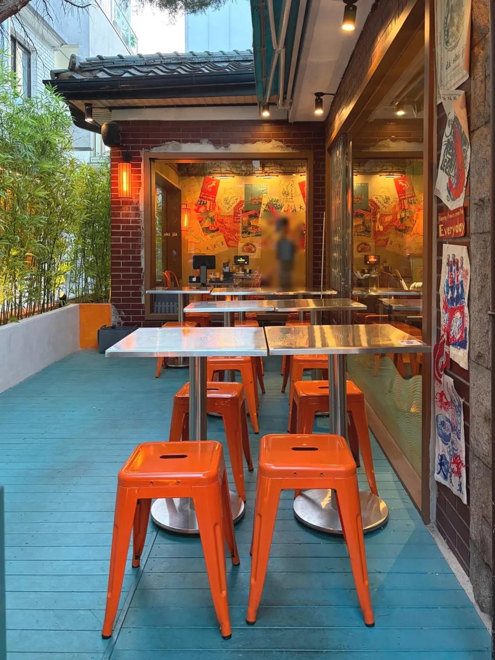 Terrace seating with an open-air market feel at Ttasijia Yeonnam