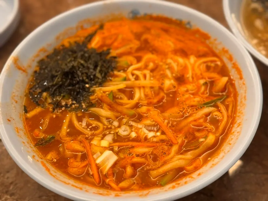 A bowl of cham daseon kalguksu with clean broth