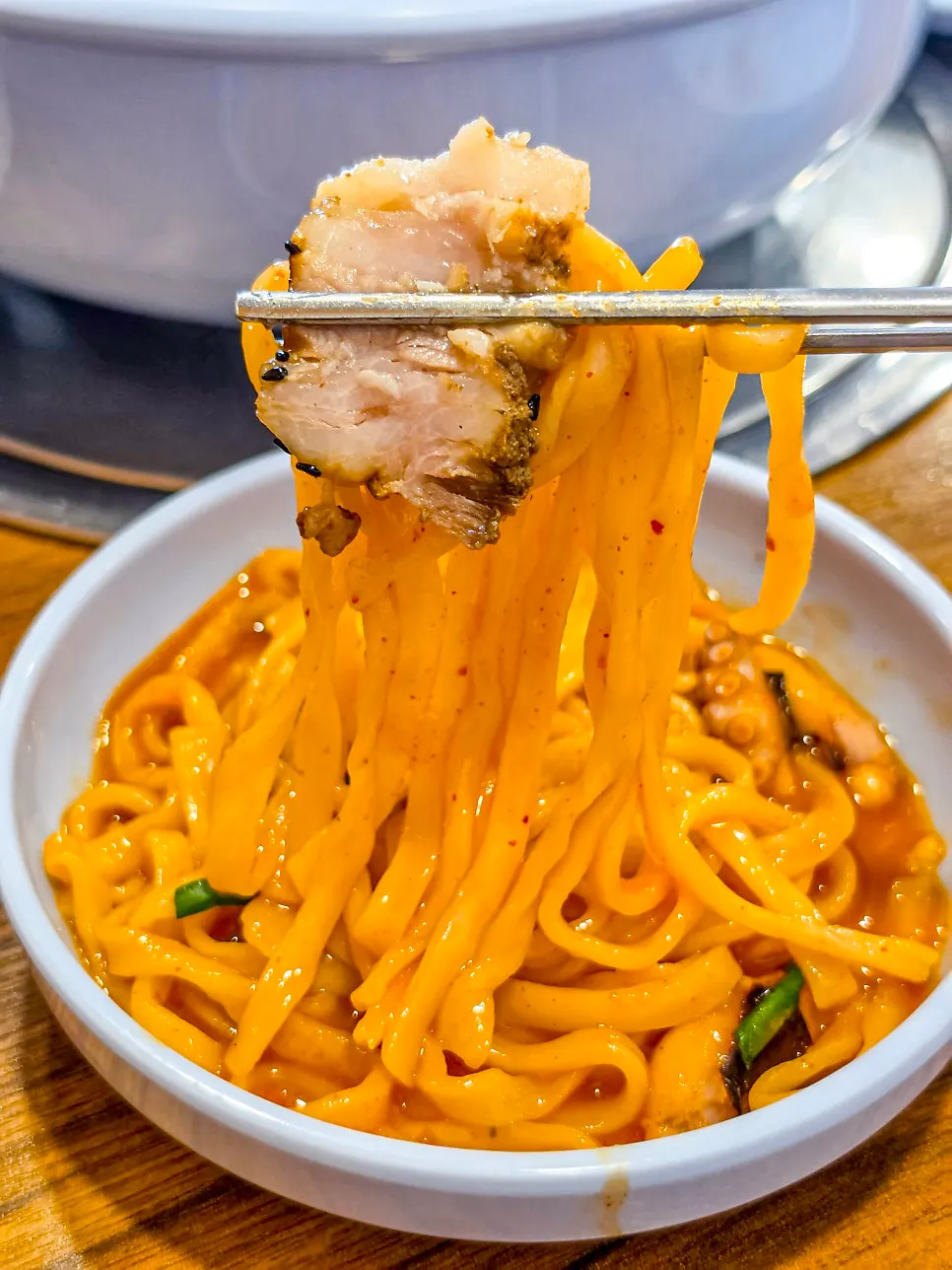 A plate combining kal-nakji and boiled pork together