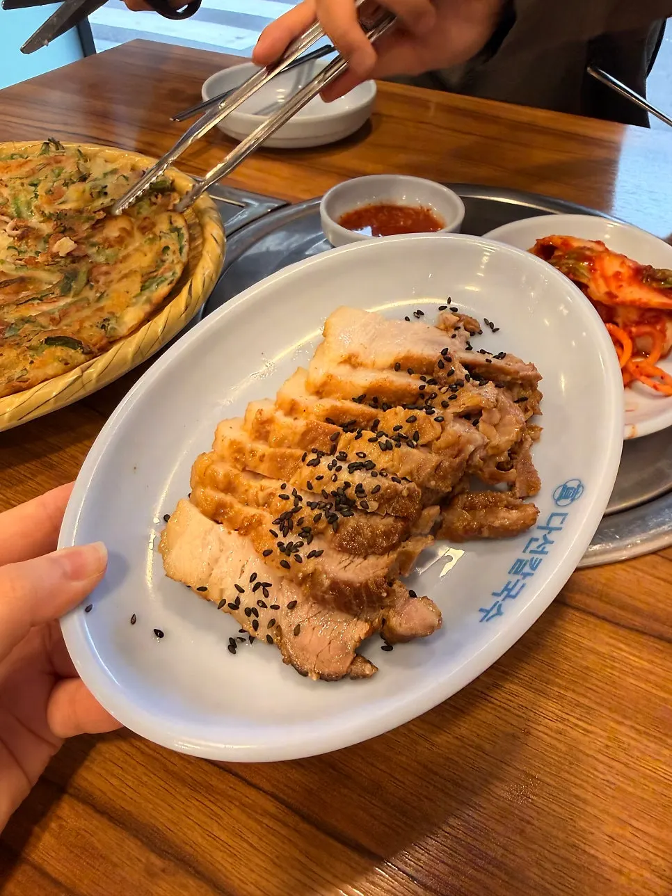 Boiled pork wrapped in geotjeori kimchi