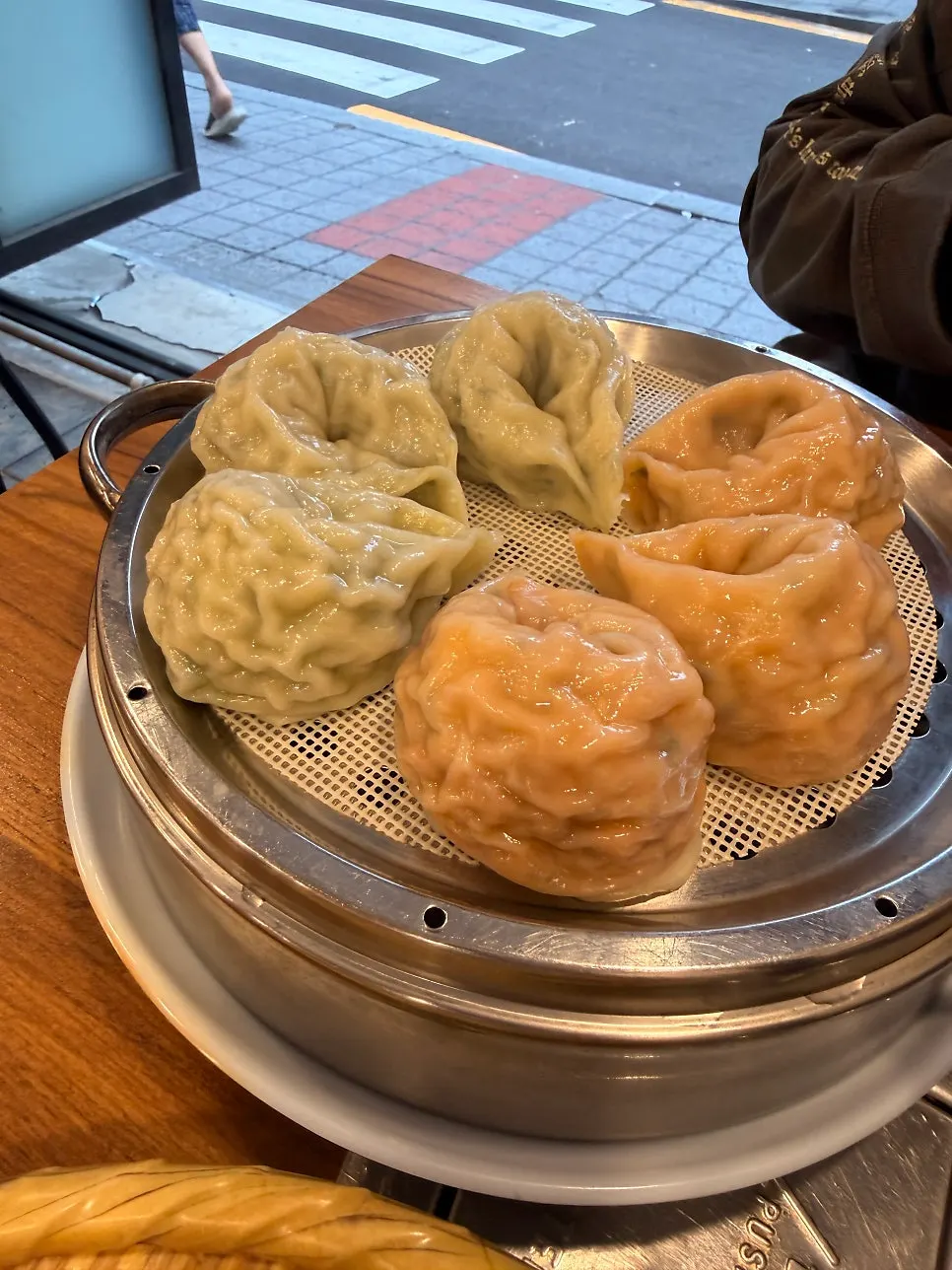 Half-and-half plate of kimchi and meat dumplings