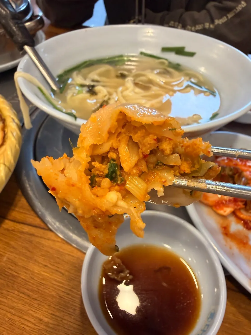Cross-section of a kimchi dumpling packed with filling