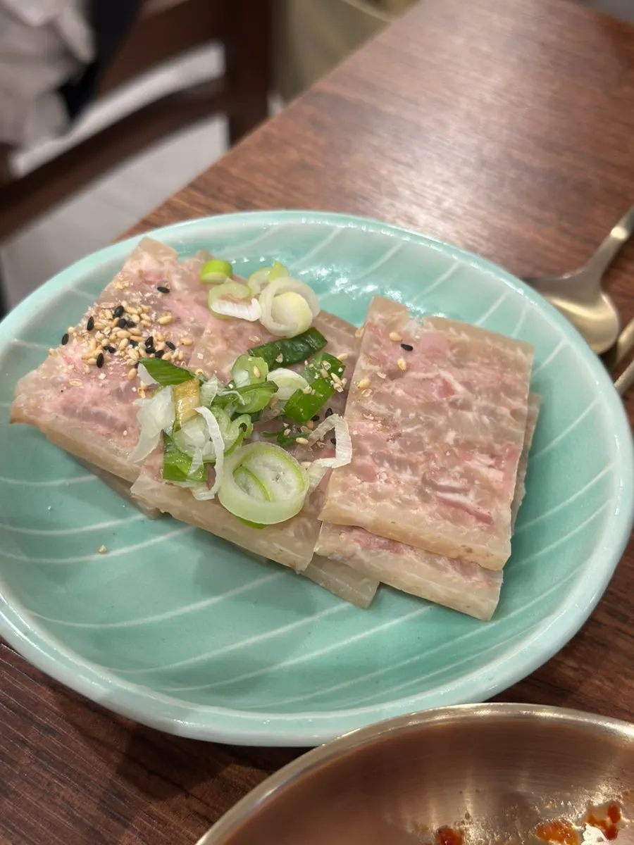 Spicy sundaeguk served together with pyeonyuk