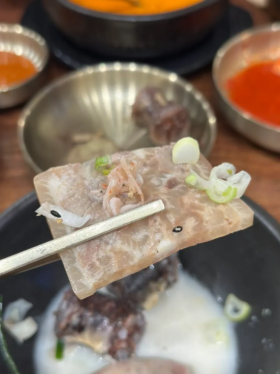 Pyeonyuk dipped in salted shrimp sauce