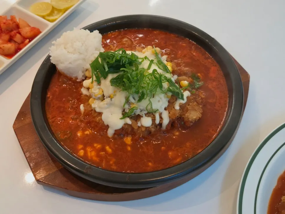 Hot pot cutlet bubbling in a stone pot